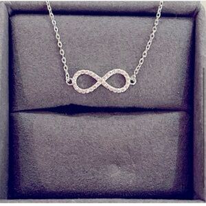 NWOT-Sterling Silver Infinity Necklace with CZ Stones Size: 16" with 2" extender